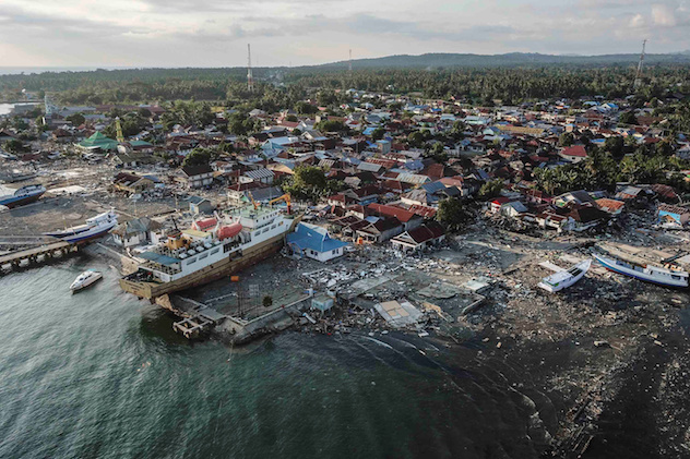 A ship is seen stranded on the shore after an earthquake and tsunami hit the area in Wani, Donggala, Central Sulawesi, Indonesia October 1, 2018 in this photo taken by Antara Foto. - Antara Foto/Muhammad Adimaja/ via REUTERS 