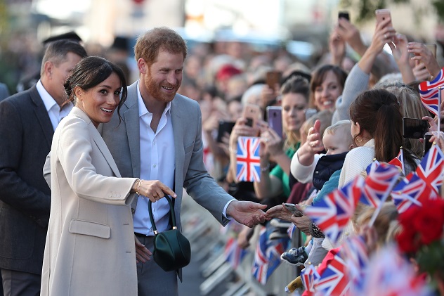 Britain's Prince Harry, and Meghan, Duchess of Sussex greet well-wishers as they arrive for a visit to Edes House, in Chichester, Britain October 3, 2018. Daniel Leal-Olivas/pool via Reuters
