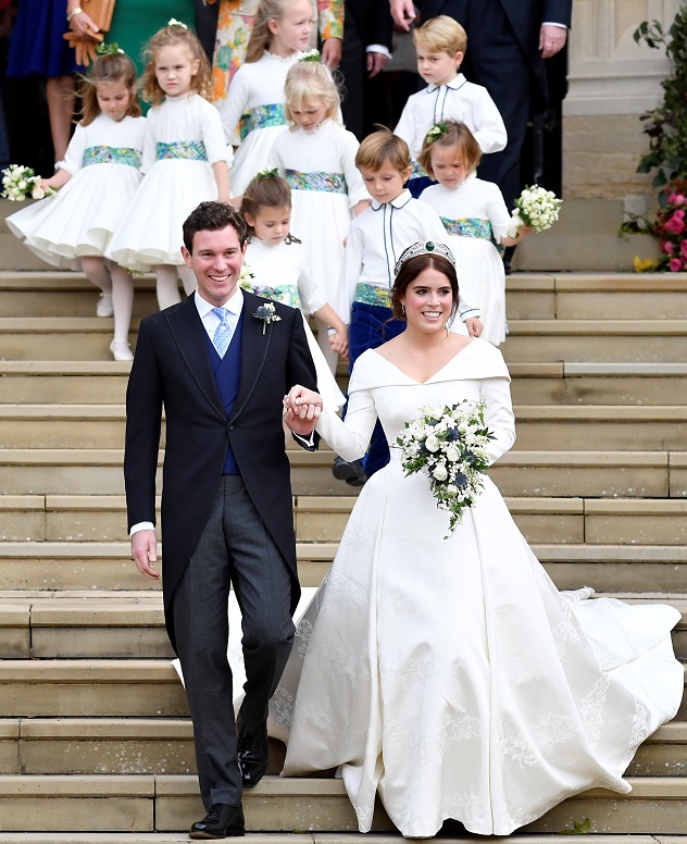 Britain's Princess Eugenie of York and her husband Jack Brooksbank leave after their wedding at St George's Chapel in Windsor Castle, Windsor, Britain October 12, 2018. REUTERS/Toby Melville - RC1BF01A9390