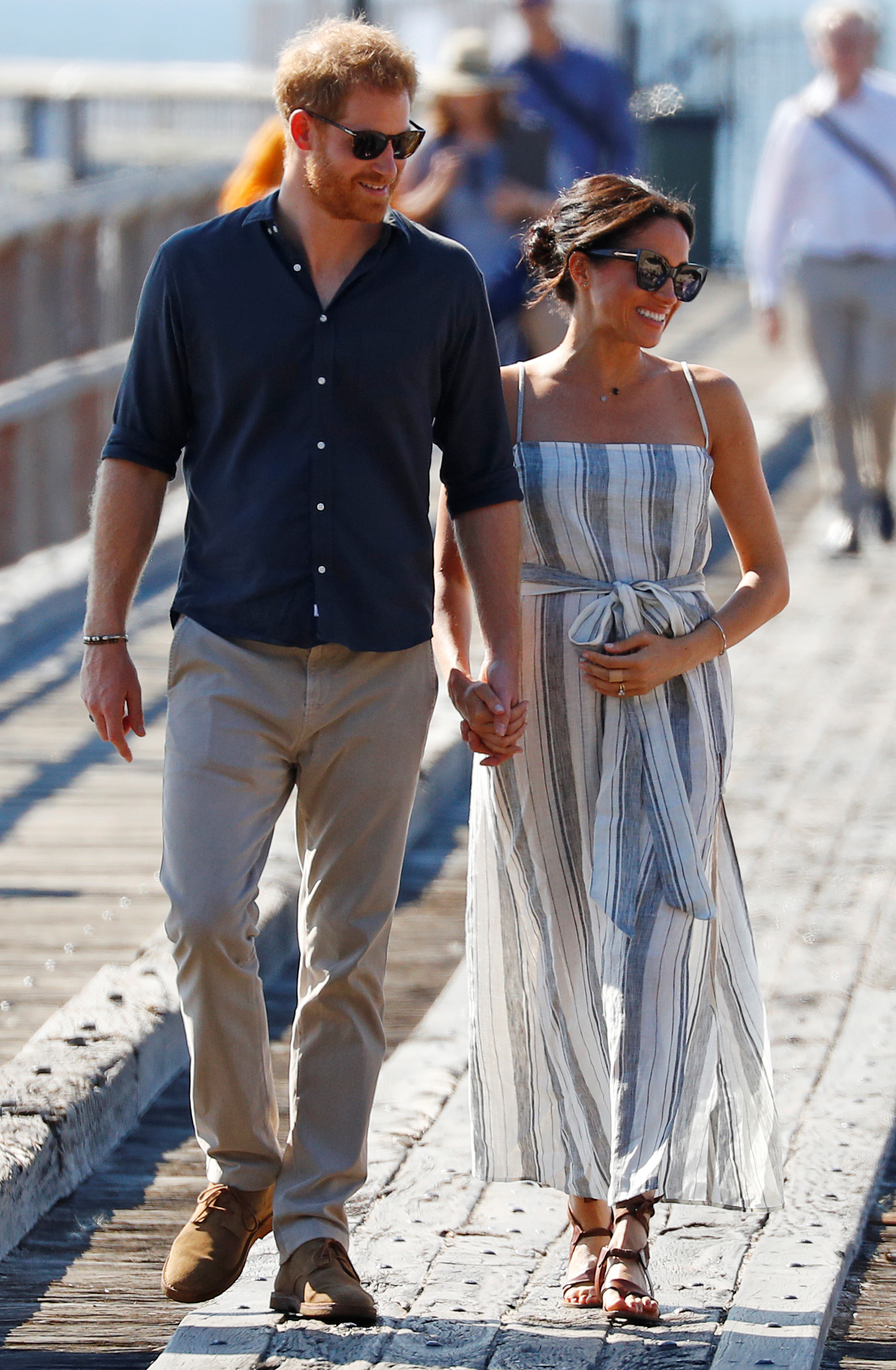 The Duchess of Sussex wears a Reformation linen dress while visiting Fraser Island, Australia.