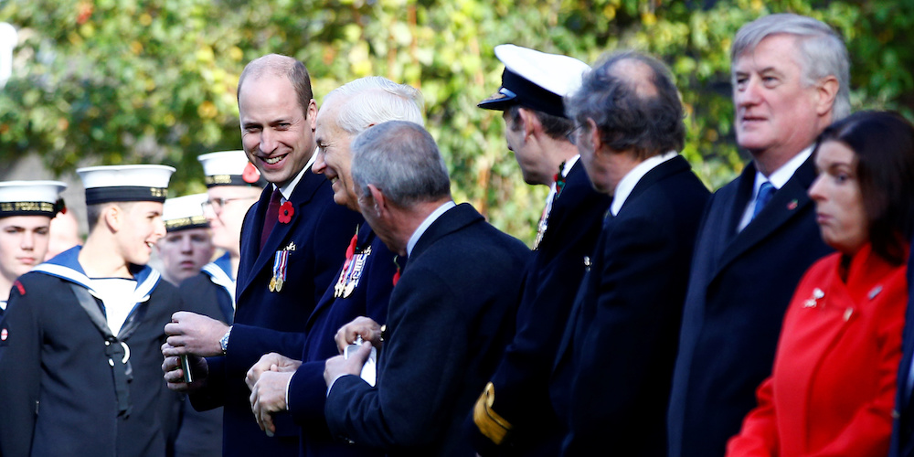 Britain's Prince William reacts after drinking from a hip flask during a ceremony as he attends a Submariners' Remembrance Service and Parade, held each year to honour submariners of all generations who have "Crossed the Bar" in service to their country, at Middle Temple in London, Britain, November 4, 2018.  REUTERS/Henry Nicholls/Pool - RC1F6BDE2E60
