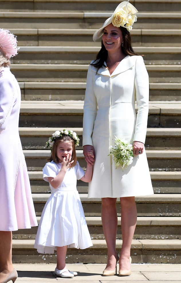 Britain's Catherine (R), Duchess of Cambridge and her daughter Princess Charlotte (L) leave St George's Chapel in Windsor Castle after the royal wedding ceremony of Prince Harry, Duke of Sussex and Meghan, Duchess of Sussex in Windsor, Britain, 19 May 2018. The couple have been bestowed the royal titles of Duke and Duchess of Sussex on them by the British monarch.  NEIL HALL/Pool via REUTERS - RC16E1AF0CC0