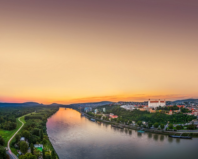 Castle of Bratislava on the Right Bank of Danube River at Sunset