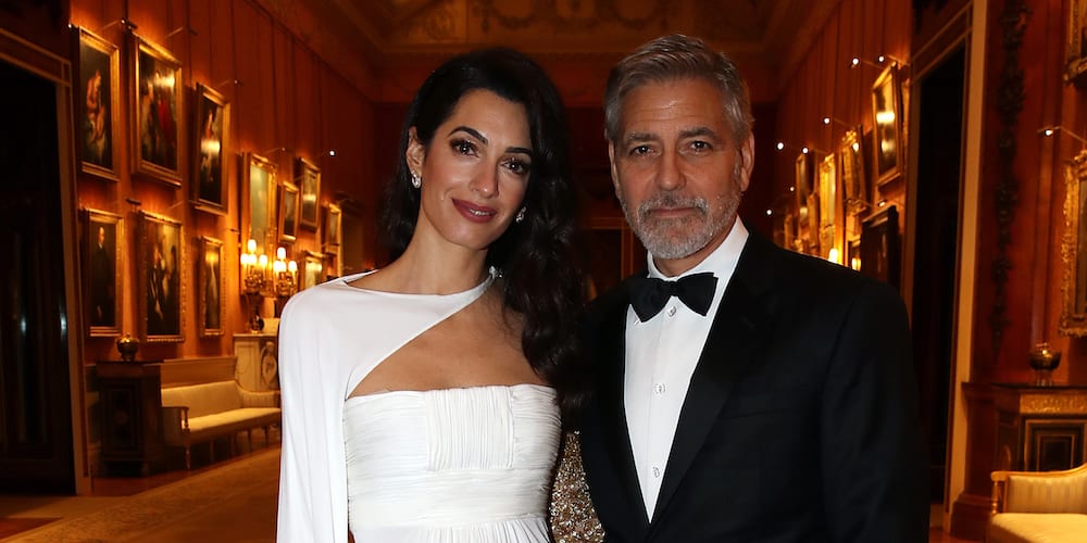 LONDON, ENGLAND - MARCH 12: Amal Clooney and George Clooney attend a dinner to celebrate The Prince's Trust, hosted by Prince Charles, Prince of Wales at Buckingham Palace on March 12, 2019 in London, England. The Prince of Wales, President, The Prince‚Äôs Trust Group hosted a  dinner for donors, supporters and ambassadors of Prince‚Äôs Trust International. (Photo by Chris Jackson - WPA Pool/Getty Images)