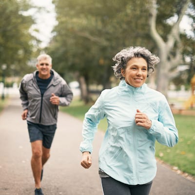 Shot of a senior couple out for a run in the park