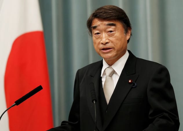 Japan's Health, Labor and Welfare Minister Takumi Nemoto attends a news conference in Tokyo