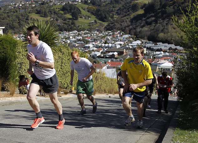 Competitors take part in the traditional "Steepest Race in the World" in Baldwin street in Dunedin September 18, 2011. Photo Credit: REUTERS/Brandon Malone