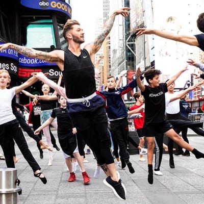 Dancers take over Times Square for Prince George after TV host’s remarks