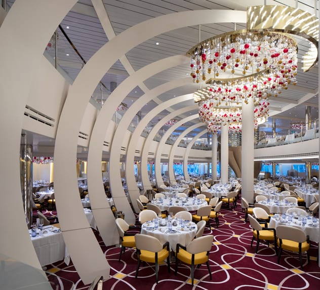 The design of the opulent dining room is a nod to the ship's musical and cultural influence.