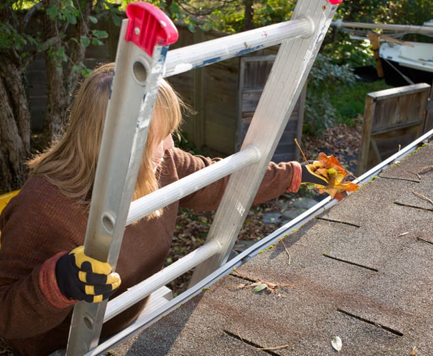 Make sure you clear the gutters before the inevitable spring showers hit. ISTOCK