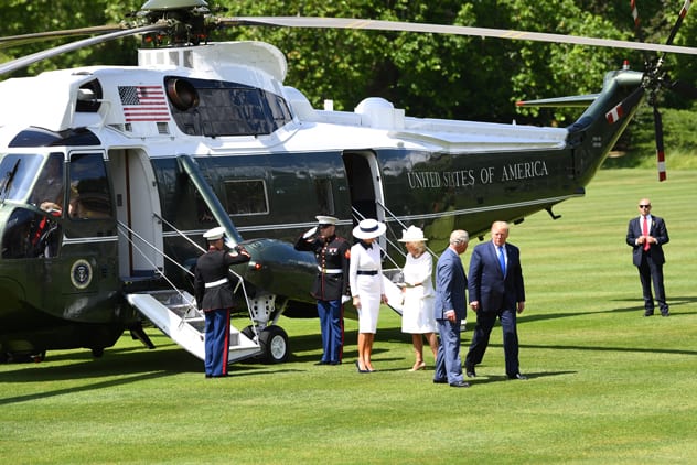 Trump was welcomed off helicopter Marine One by Prince Charles and the Duchess of Cornwall. REUTERS