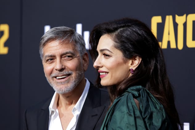 Eyes for each other: George and Amal at the premiere of Catch 22 in which George starred. REUTERS