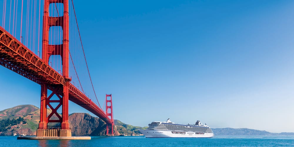 The Crystal Symphony ducks under San Francisco's magnificent Golden Gate Bridge on its journey down the Pacific Coast.