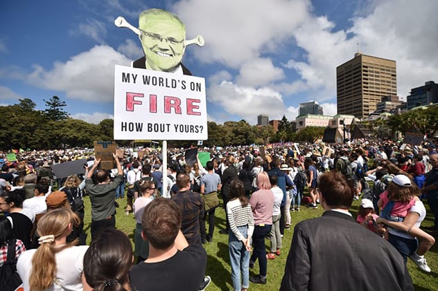 People attend a protest as part of the worlds largest climate strike in Sydney on September 20, 2019. Image: PETER PARKS/AFP/Getty Images