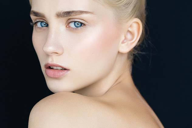 Studio shot of young beautiful woman