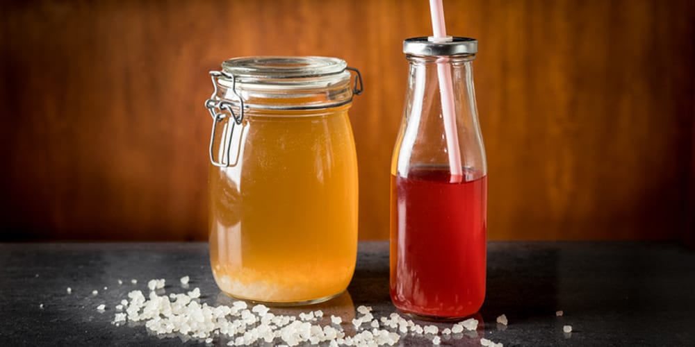Kombucha and kefir water are both touted for their health benefits but should we be choosing one over the other? ISTOCK