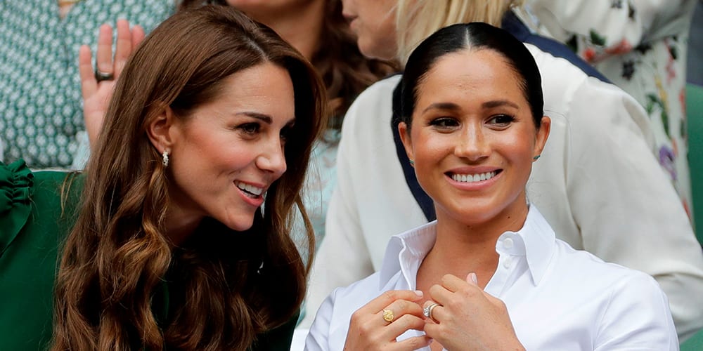 Tennis - Wimbledon - All England Lawn Tennis and Croquet Club, London, Britain - July 13, 2019  Britain's Catherine, Duchess of Cambridge, with Meghan, Duchess of Sussex, in the Royal Box ahead of the final between Serena Williams of the U.S. and Romania's Simona Halep  Ben Curtis/Pool via REUTERS - RC143B612B60