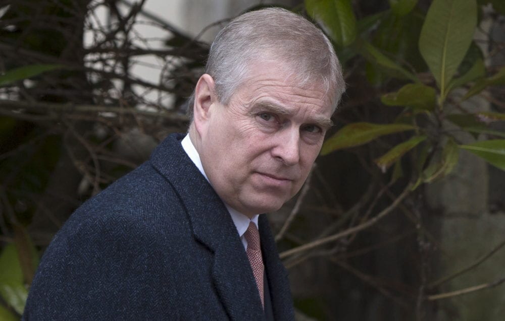 Britain's Prince Andrew leaves after attending the Easter Sunday service at St Georges Chapel at Windsor Castle in southern England April 5, 2015. REUTERS/Neil Hall - GF10000050236