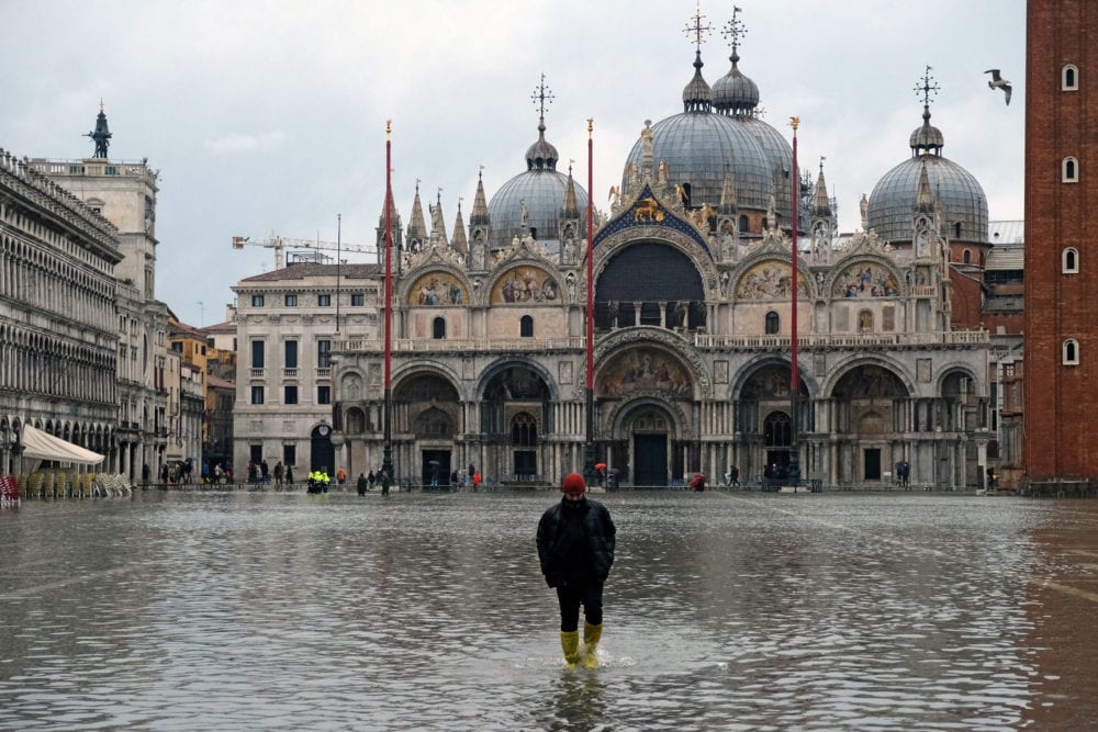 A man walks in St. Marks Square after days of severe flooding in Venice, Italy November 17, 2019. REUTERS/Manuel Silvestri - RC2YCD9KK25W