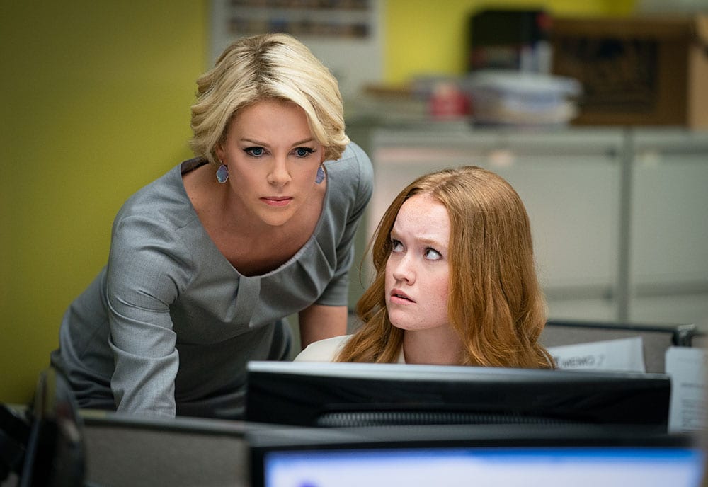 Charlize Theron as ‘Megyn Kelly’ and Liv Hewson as ‘Lily Balin’ in BOMBSHELL. Photo Credit: Hilary Bronwyn Gayle.