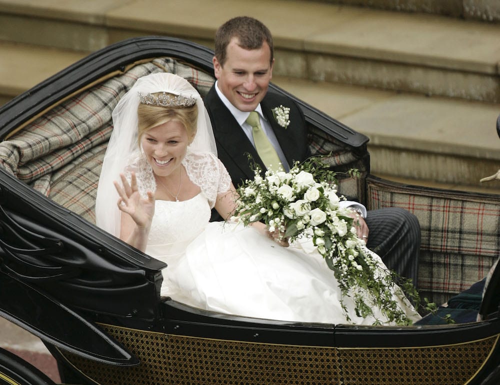 Britain's Peter Phillips (R) and Canada's Autumn Kelly leave St George's Chapel after their marriage in Windsor, southern England on May 17, 2008.       REUTERS/Sang Tan/Pool