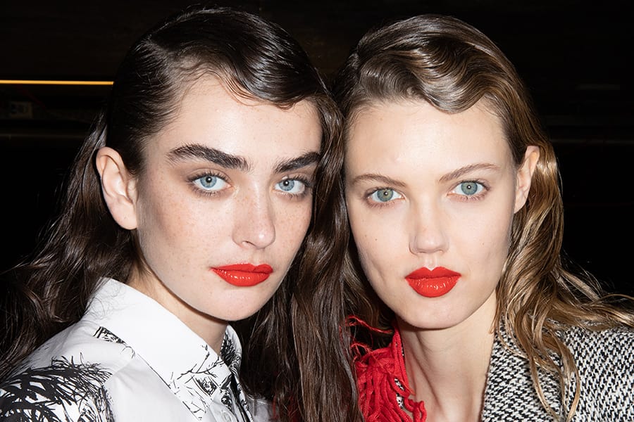 MILAN, ITALY - FEBRUARY 22: (L-R) Model Alisha Nesvat and Lindsey Wixson are seen backstage at the MSGM fashion show on February 22, 2020 in Milan, Italy. (Photo by Rosdiana Ciaravolo/Getty Images)