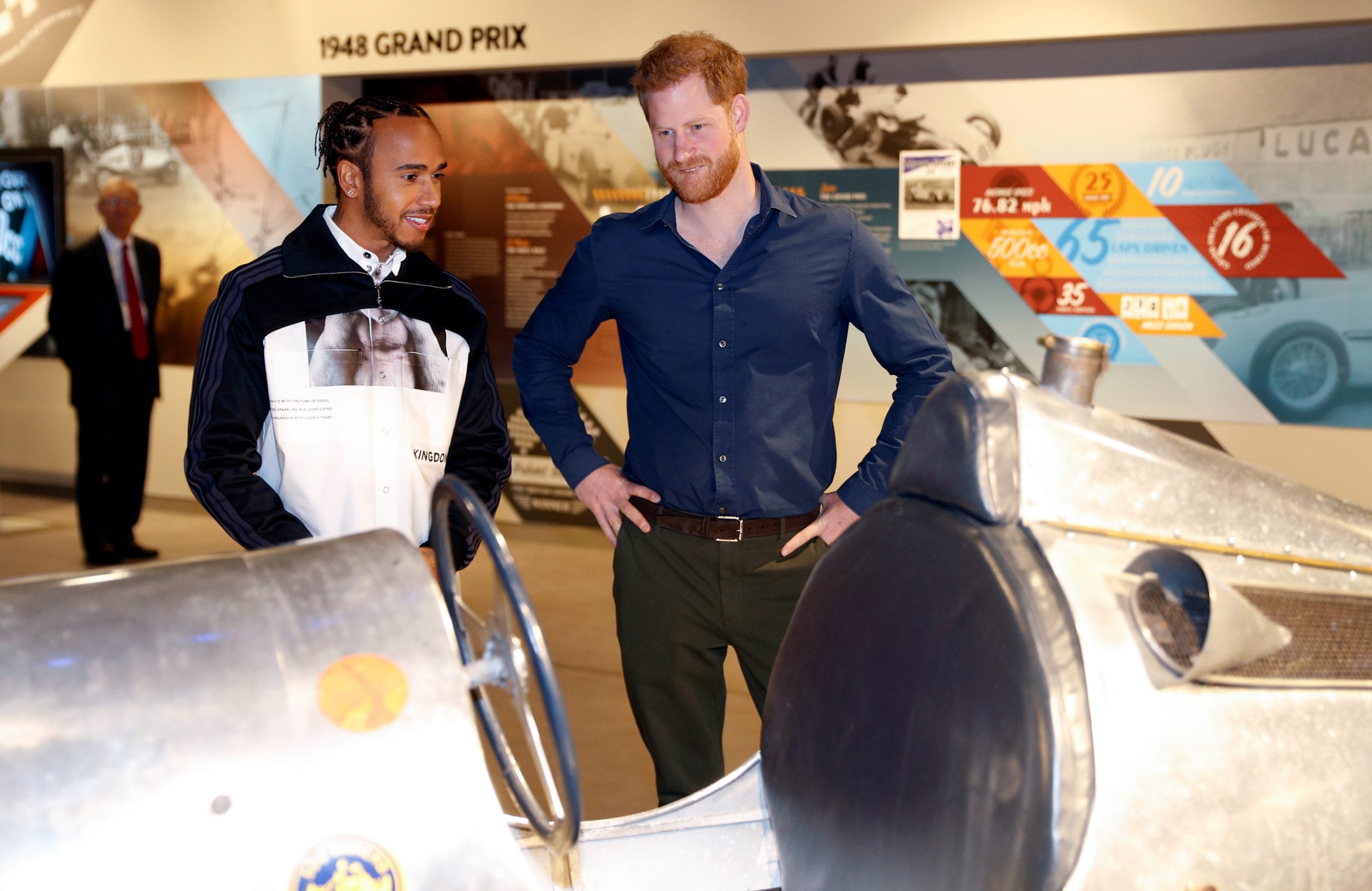 Britain's Prince Harry and Formula One World Champion Lewis Hamilton react as they visit the Silverstone circuit in Towcester, Britain, March 6, 2020. REUTERS/Peter Nicholls/Pool - RC2CEF91HK2Y