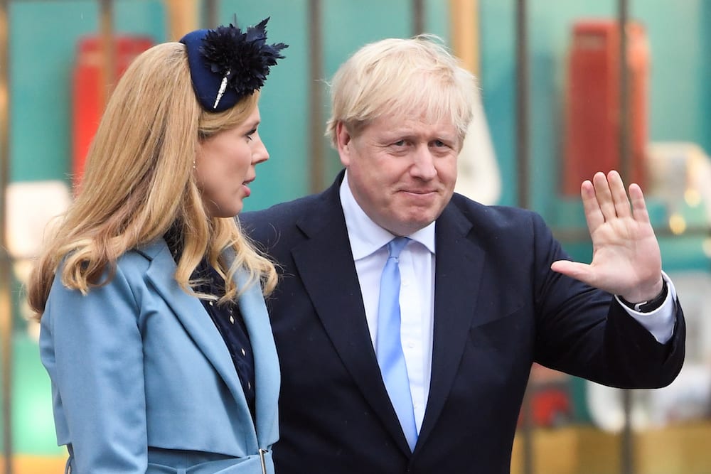 Britain's Prime Minister Boris Johnson and his partner Carrie Symonds leave after the annual Commonwealth Service at Westminster Abbey in London, Britain March 9, 2020. REUTERS/Toby Melville - RC2GGF9RW1IH