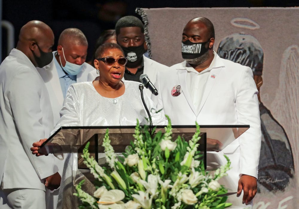 FILE PHOTO: The family of of George Floyd comes to the podium to speak during the funeral for George Floyd, June 9, 2020, at The Fountain of Praise church in Houston. Floyd died after being restrained by Minneapolis Police officers on May 25. Godofredo A. Vasquez/Pool via REUTERS
