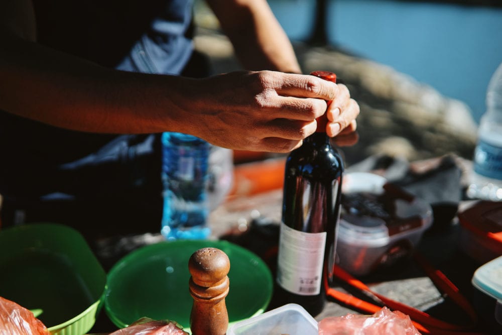 Bottle of wine on picnic table