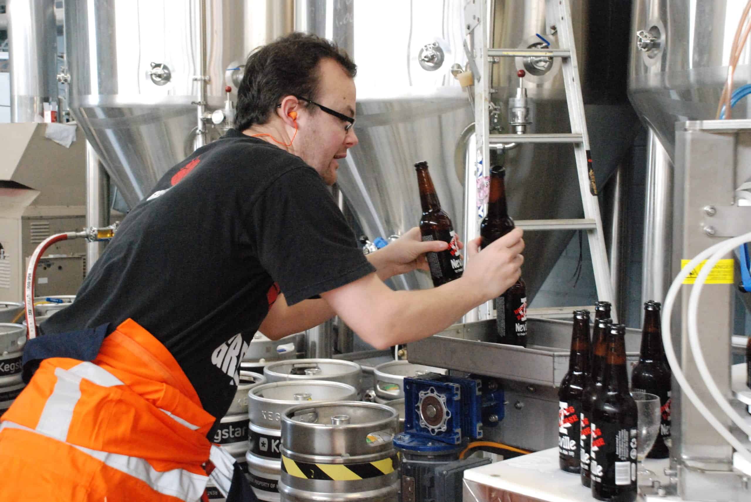 <em>Cameron bottling up the original Neville Pale Ale</em>