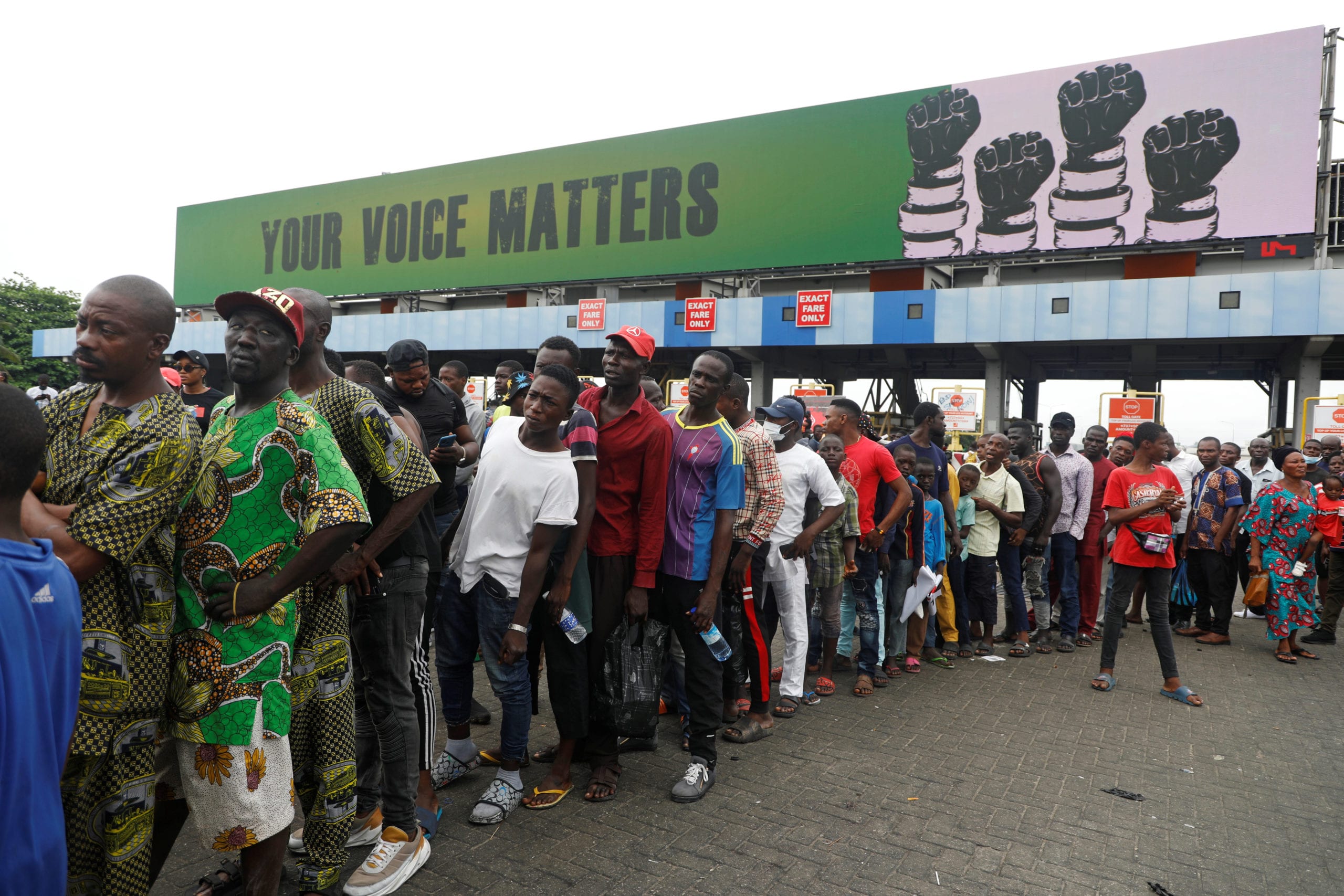 Demonstrators queue up to receive food during a protest over police brutality in Lagos, Nigeria October 16, 2020. Picture taken October 16, 2020. REUTERS/Temilade Adelaja