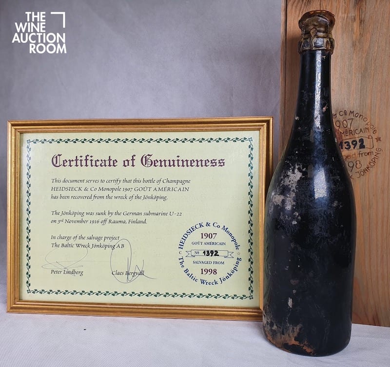 Century-old champagne recovered from shipwreck sells at auction