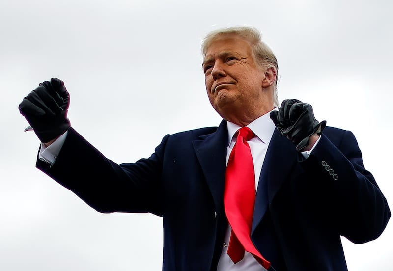 FILE PHOTO: U.S. President Donald Trump holds a campaign rally at Oakland County International Airport in Waterford Township, Michigan, U.S., October 30, 2020. REUTERS/Carlos Barria