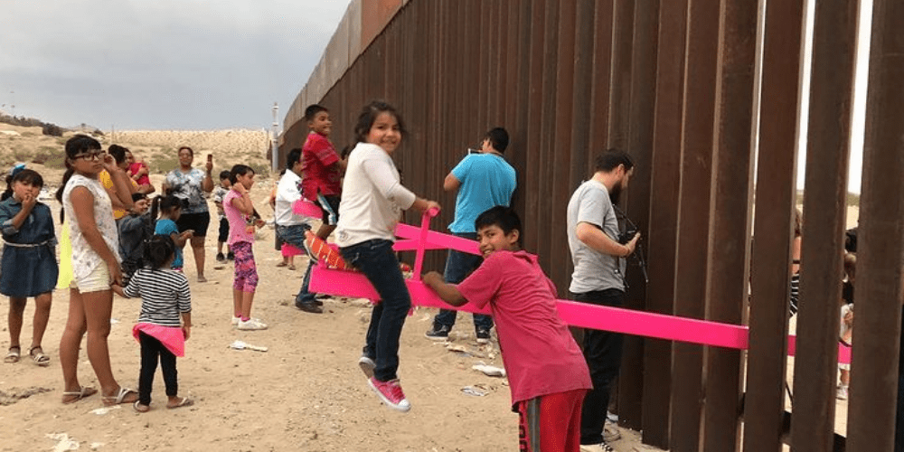Pink seesaw installed at US-Mexico border wall wins major design award