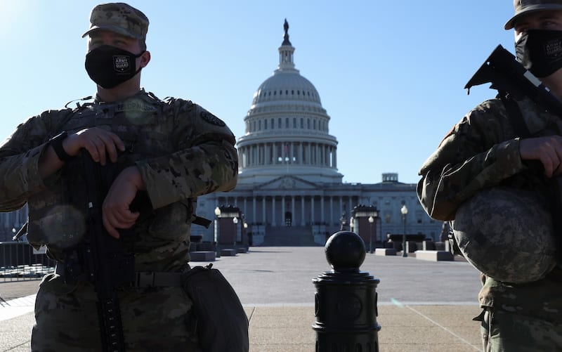 Members of the U.S. National Guard stand watch in front of the U.S. Capitol Building amid heightened security following the assault on the building on January 6 in Washington, U.S., March 3, 2021. REUTERS/Leah Millis