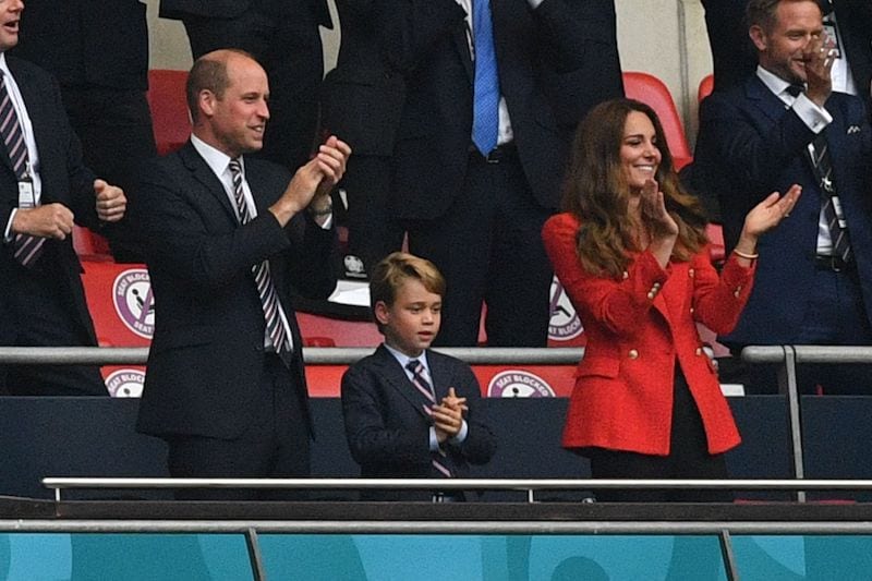 (L to R) Prince William, Duke of Cambridge, Prince George of Cambridge, and Catherine, Duchess of Cambridge, celebrate the first goal in the UEFA EURO 2020 round of 16 football match between England and Germany at Wembley Stadium in London on June 29, 2021. (Photo by JUSTIN TALLIS / POOL / AFP) (Photo by JUSTIN TALLIS/POOL/AFP via Getty Images)