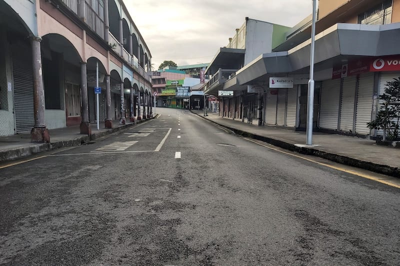 FILE PHOTO: An empty downtown street is seen as shops were closed and only essential businesses and restaurants providing takeaway service remained open as an outbreak of the coronavirus disease (COVID-19) affects Suva, Fiji, June 27, 2021. Picture taken June 27, 2021.  REUTERS/David Hotchin