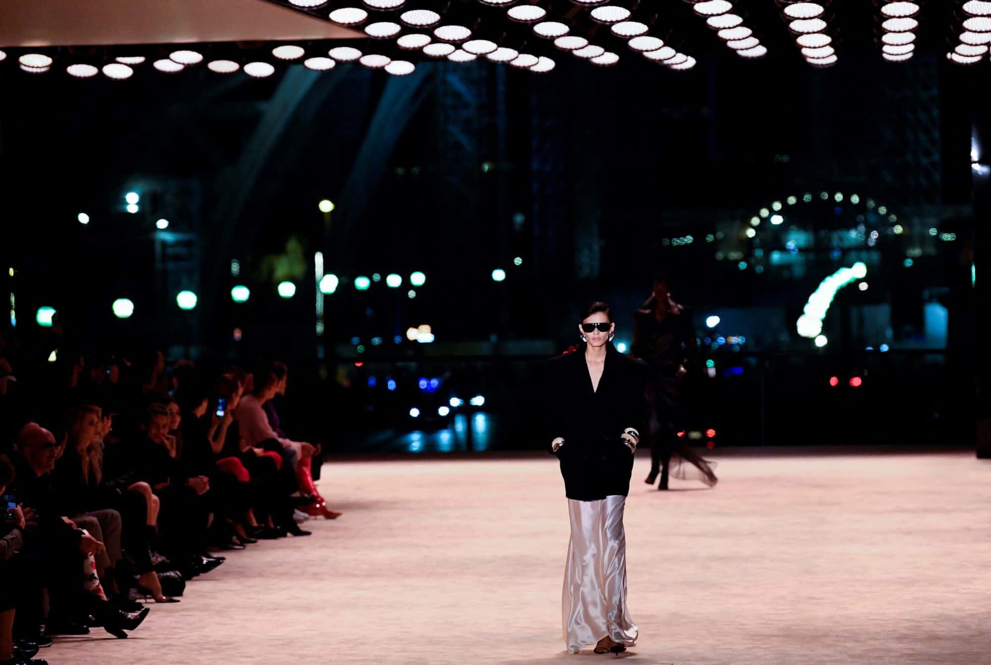 Yves Saint Laurent sends silky evening gowns down Eiffel Tower runway