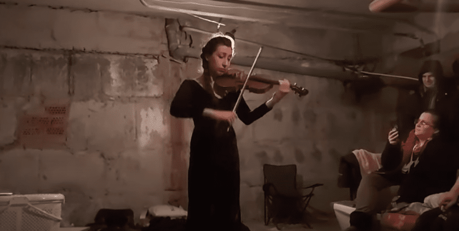 Ukrainian musician Vera Lytovchenko plays in a bomb shelter