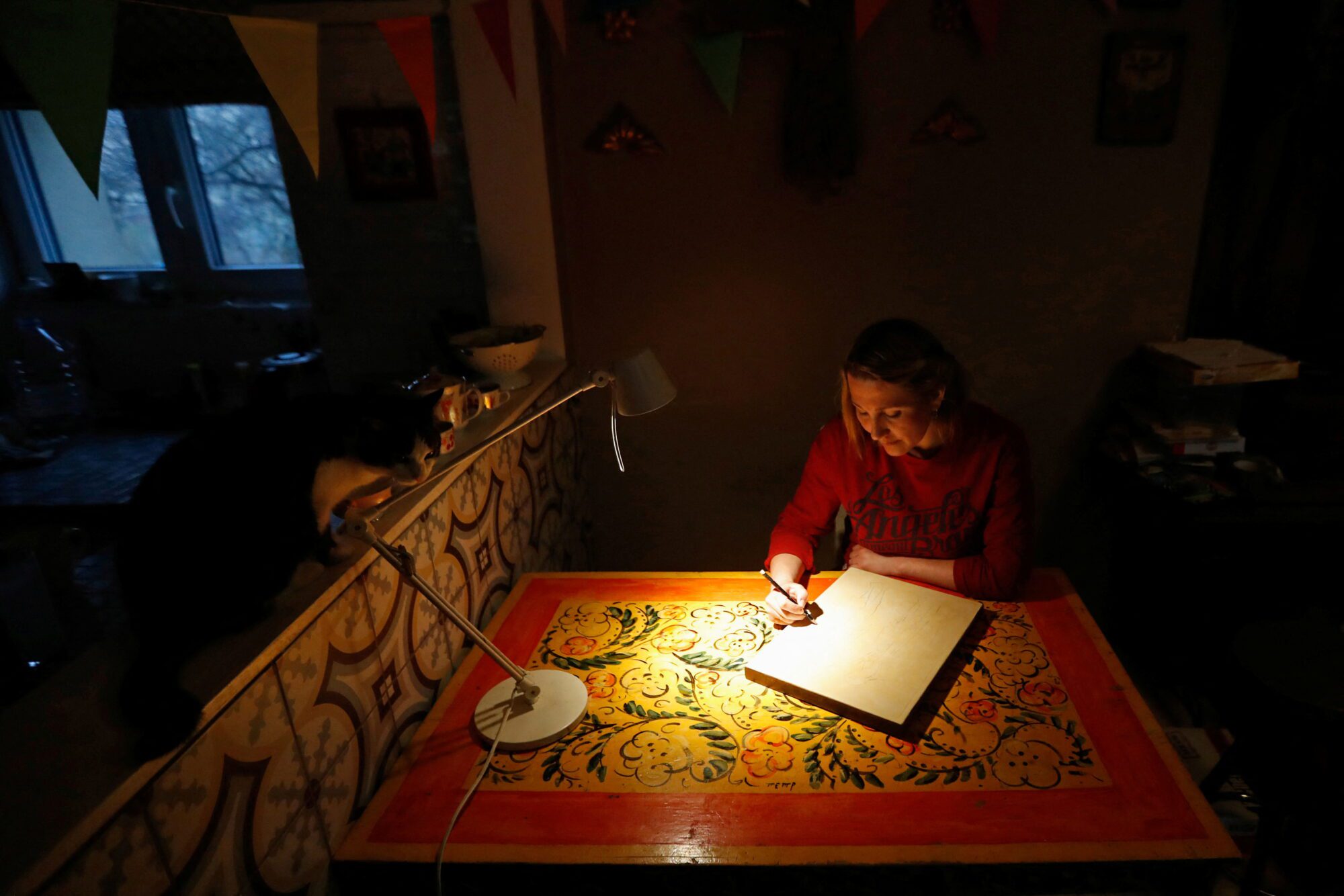 Ukrainian refugee Yulia Sarycheva lives in a house with Russian family in Prague