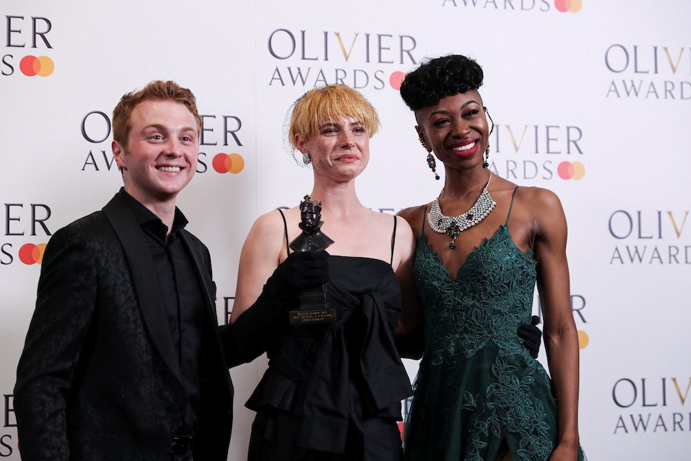Jessie Buckley poses after wining the Best Actress in a Musical award for the "Cabaret" with Miriam Teak-Lee and Sam Tutty at the Olivier Awards in the Royal Opera House in London, Britain April 10, 2022. REUTERS/May James