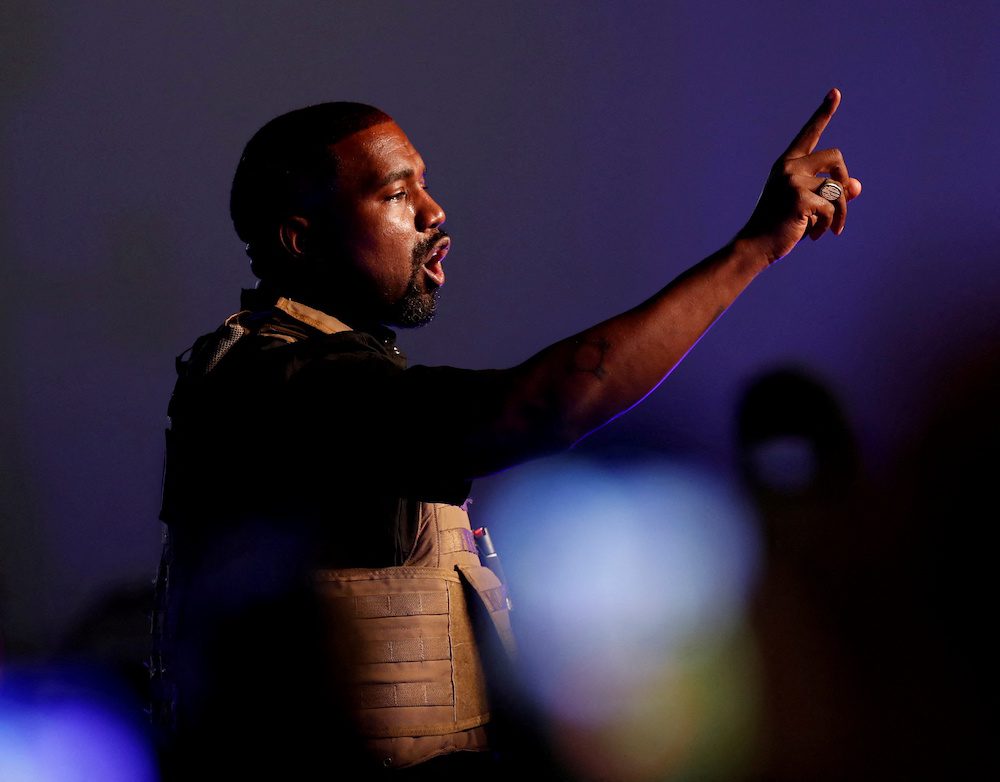 FILE PHOTO: Rapper Kanye West gestures to the crowd as he holds his first rally in support of his presidential bid in North Charleston, South Carolina, U.S. July 19, 2020.  REUTERS/Randall Hill/File Photo