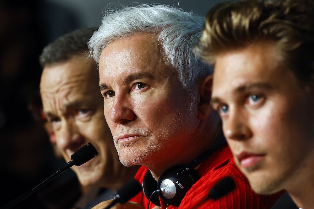 The 75th Cannes Film Festival - News conference for the film "Elvis" Out of Competition - Cannes, France, May 26,  2022. Director Baz Luhrmann, and cast members Tom Hanks and Austin Butler attend. REUTERS/Eric Gaillard