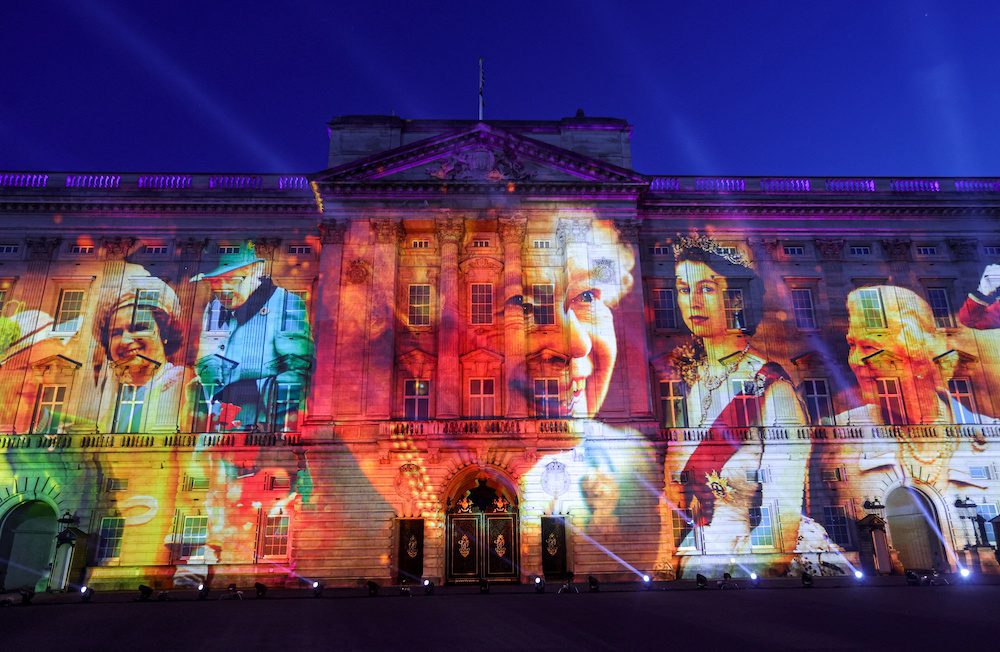 Projections are seen displayed on the front of the Buckingham Palace during the lighting of the principal jubilee beacon, as part of Britain's Queen Elizabeth's Platinum Jubilee celebrations, in London, Britain June 2, 2022. Chris Jackson/Pool via Reuters