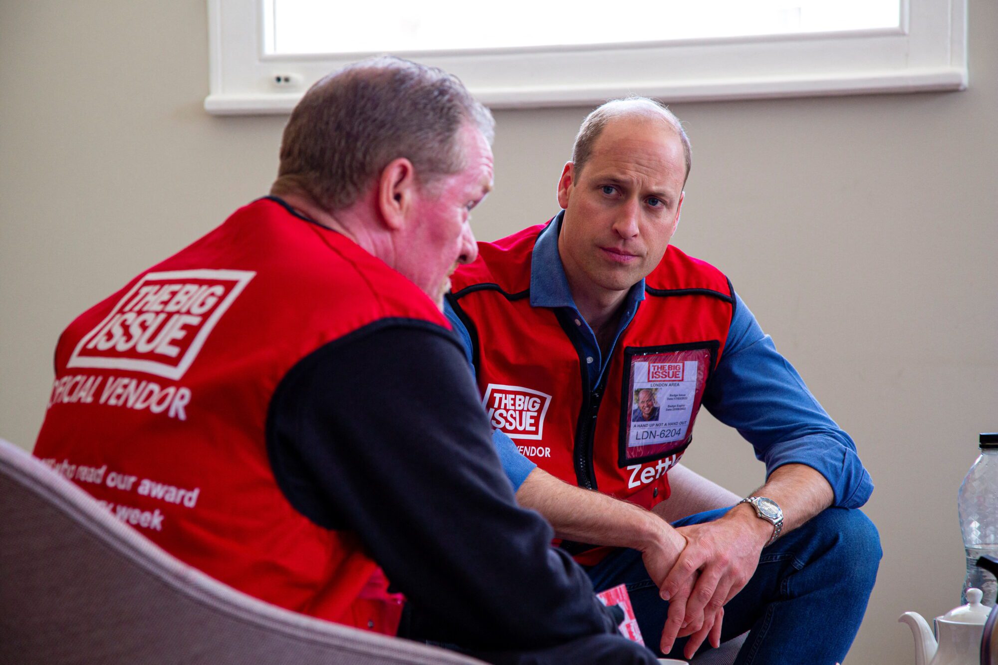 Britain's Prince William meets a vendor of The Big Issue newspaper in this undated handout picture.  Courtesy of Andy Parsons/The Big Issue/Handout via REUTERS  ATTENTION EDITORS - THIS IMAGE HAS BEEN SUPPLIED BY A THIRD PARTY. NO RESALES. NO ARCHIVES. NO ENHANCING, MANIPULATING OR MODIFYING IMAGE. MANDATORY CREDIT.