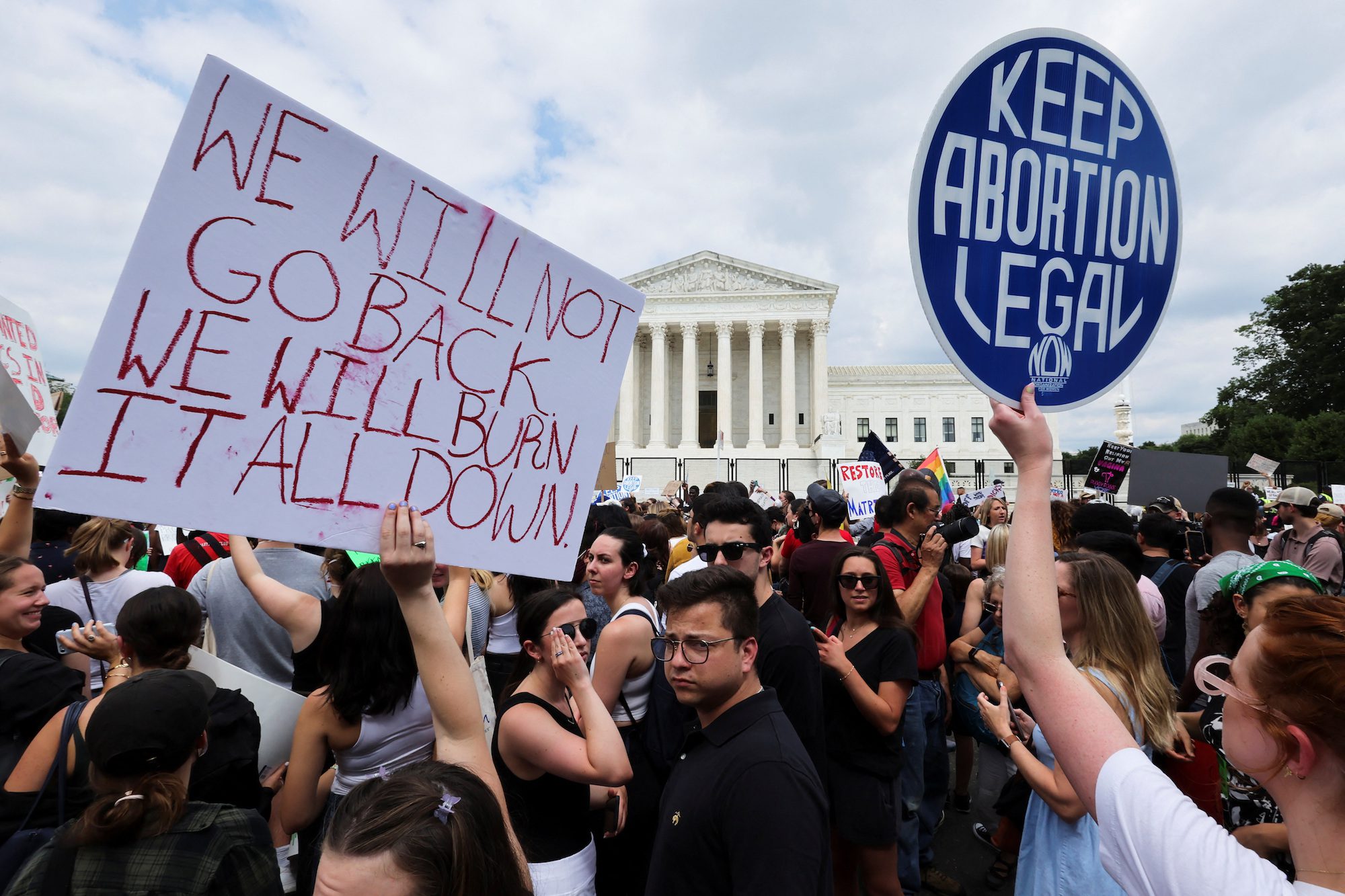 Abortion rights demonstrators protest outside the United States Supreme Court as the court rules in the Dobbs v Women's Health Organization abortion case, overturning the landmark Roe v Wade abortion decision in Washington, U.S., June 24, 2022. REUTERS/Jim Bourg