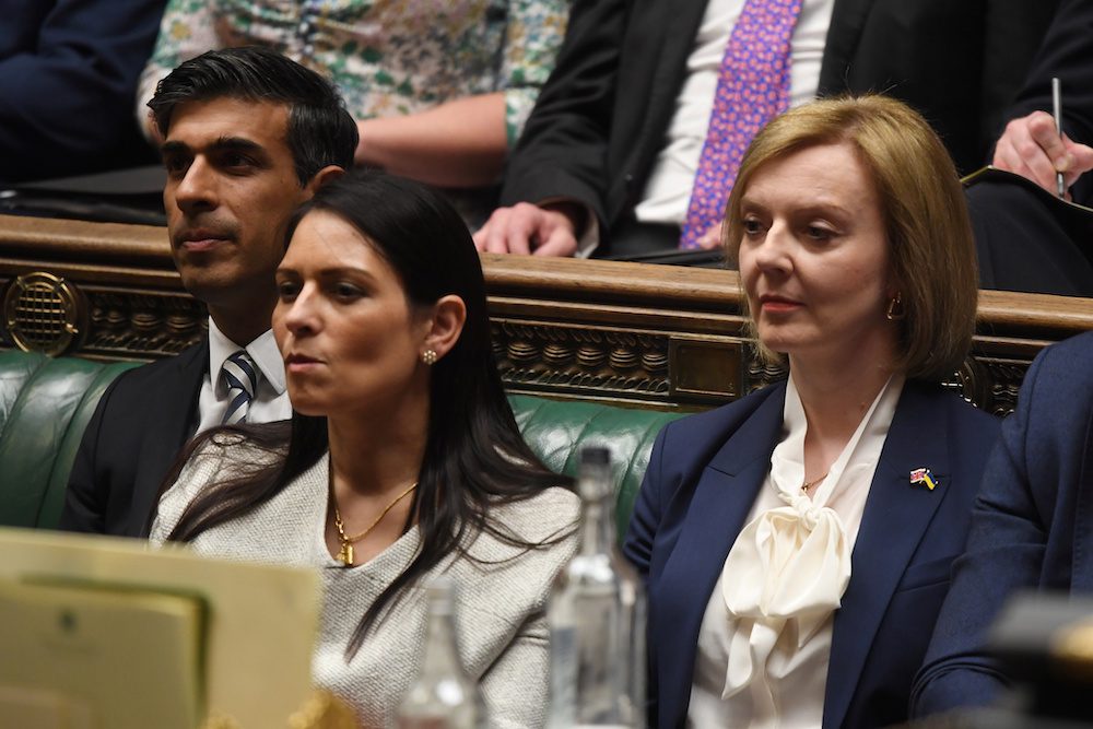 British Chancellor of the Exchequer Rishi Sunak, British Home Secretary Priti Patel and British Foreign Secretary Liz Truss attend a session at the House of Commons, in London, Britain, April 19, 2022. UK Parliament/Jessica Taylor/Handout via REUTERS    THIS IMAGE HAS BEEN SUPPLIED BY A THIRD PARTY  MANDATORY CREDIT.  IMAGE MUST NOT BE ALTERED.