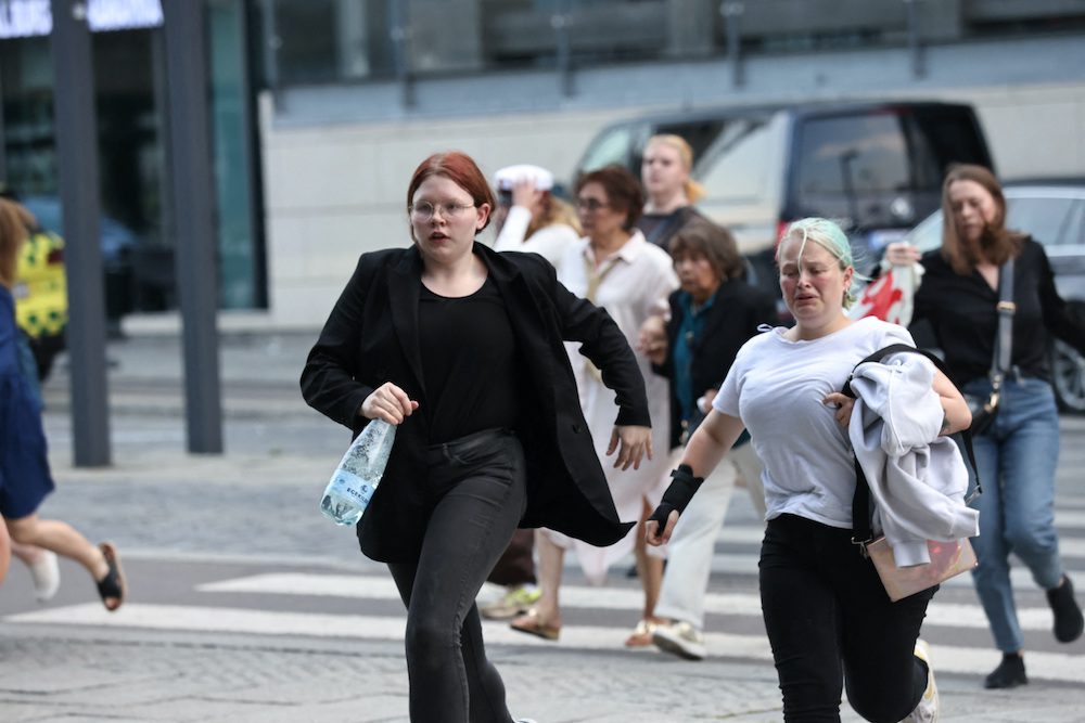 People leave Field's shopping centre, after Danish police said they received reports of shooting, in Copenhagen, Denmark, July 3, 2022. Ritzau Scanpix/Olafur Steinar Gestsson  via REUTERS