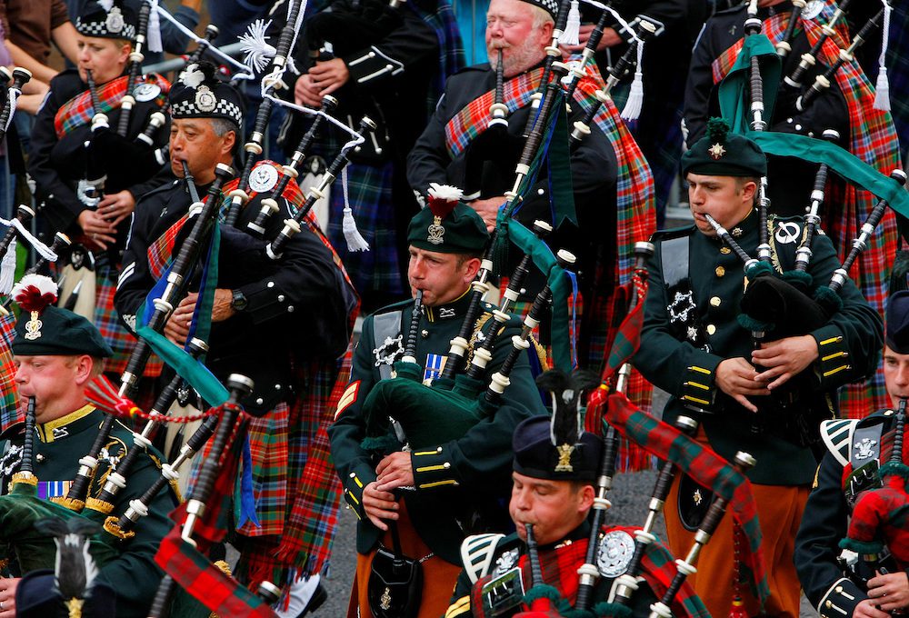 FILE PHOTO: Pipers from the Edinburgh Military Tattoo Massed Pipes and Drums perform during the Edinburgh Fringe Festival parade in Holyrood Park in Edinburgh, Scotland, August 9, 2009.